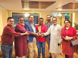 MAK Group BD leadership receiving trophy at Lions Club award ceremony
